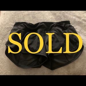 Lululemon black speed up shorts, size 8